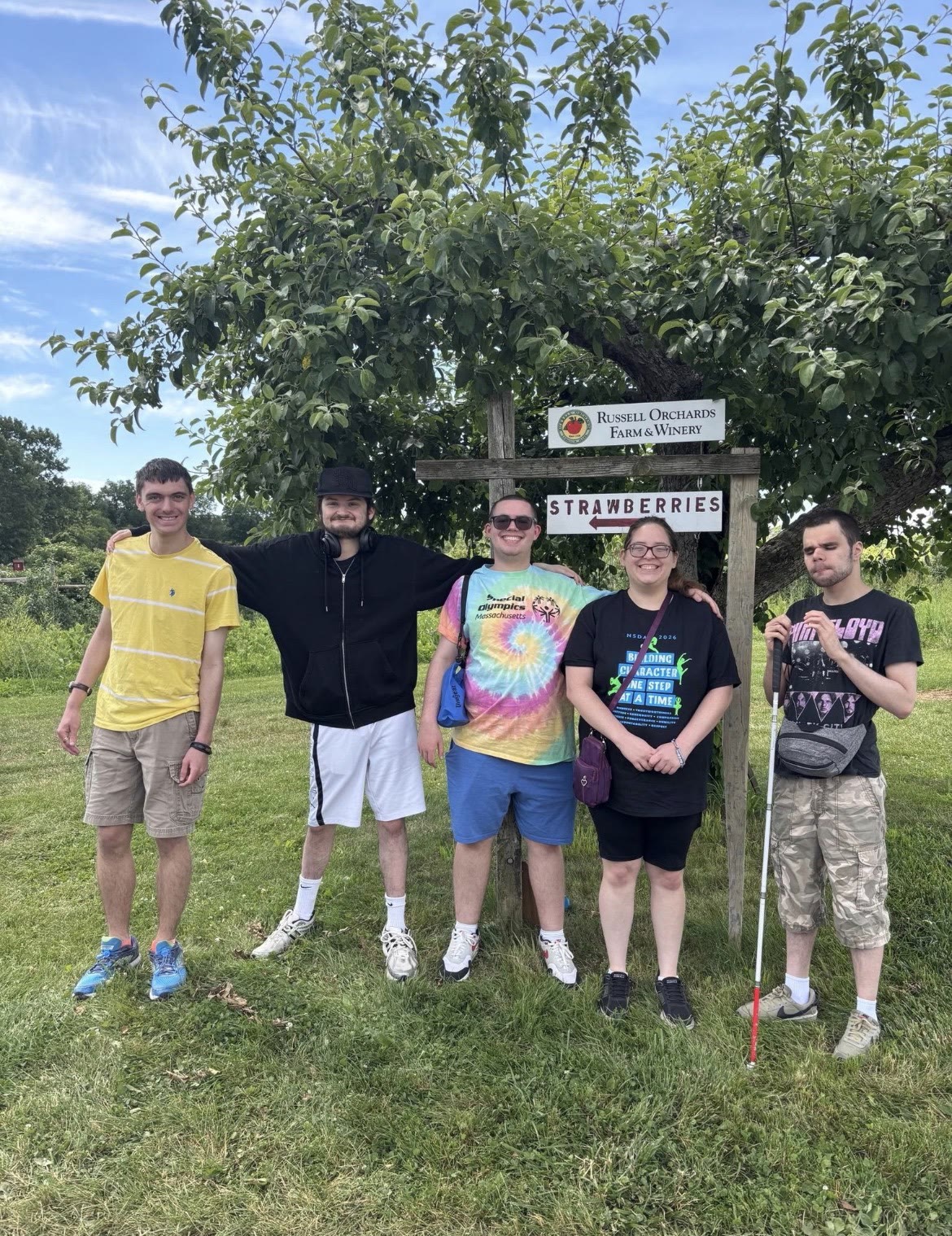 Salem CLUB participants enjoying a community outing at an orchard